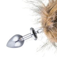 a close up of an animal's hair with a metal hook